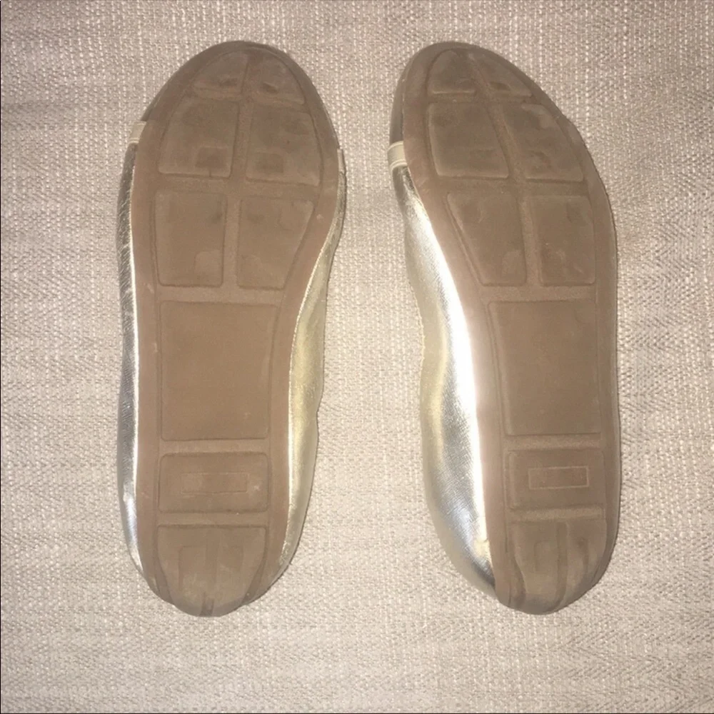Michael Kors gold “Rover Lux” flats